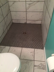 Hexagon tile shower foor curbless shower