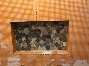 Pebbles in niche